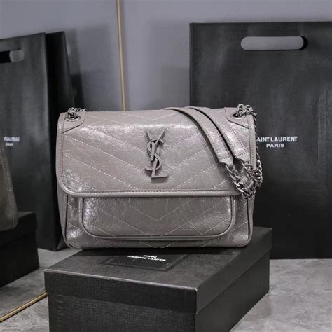 กระเป า ysl แท ปลอม|YSL leather bag.